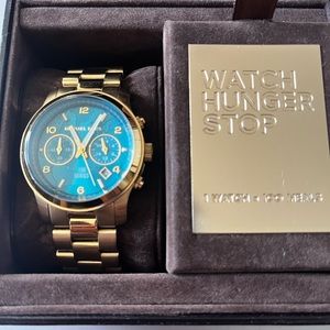Michael Kors teal globe watch